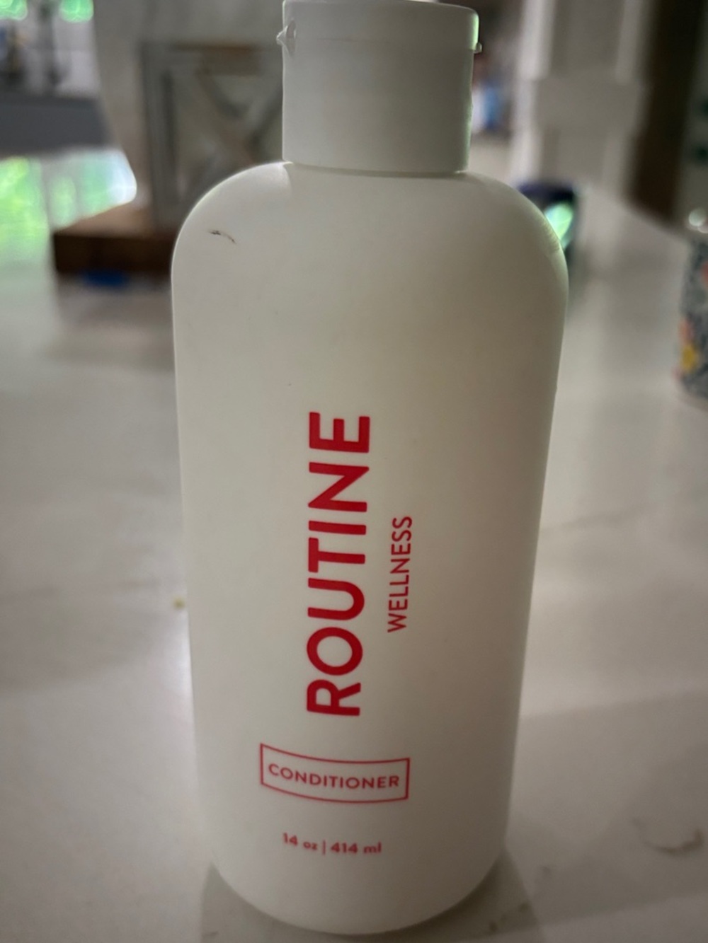 Routine Wellness Conditioner - Peony and Pomegranate scented.
